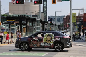 Theo Von branded vehicle driving through Edmonton